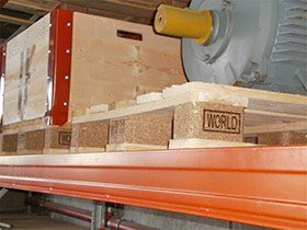 Euro pallet carrying a machine on a racking beam